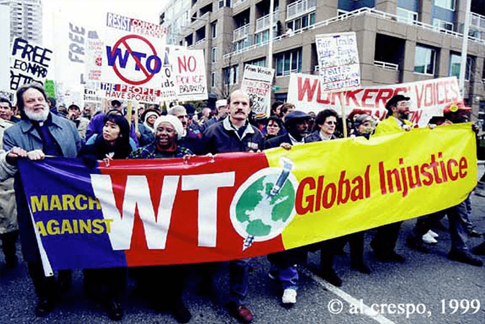 WTO protest banner, photograph by Al Crespo, 1999